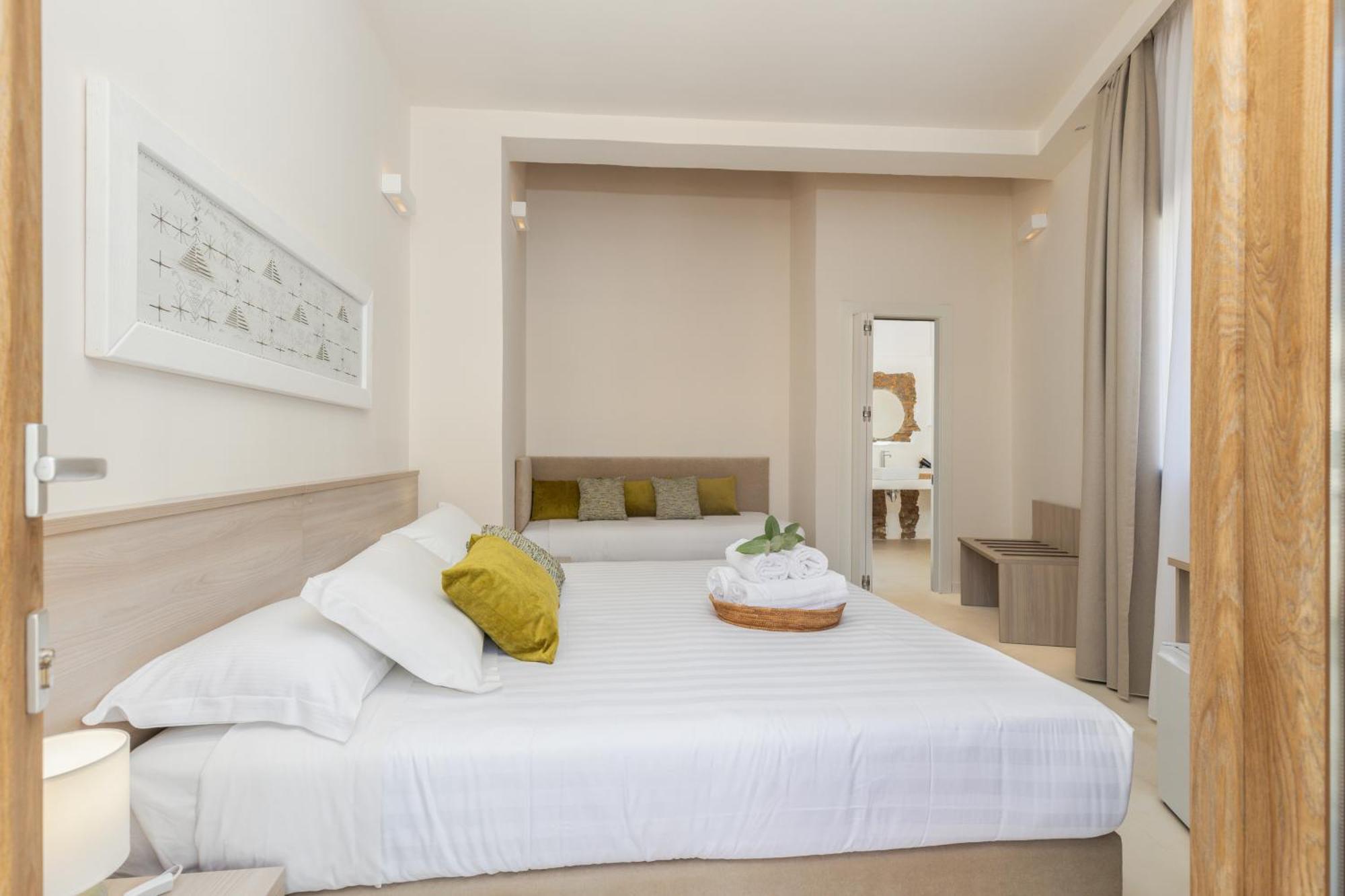 Ausentu Guest House Тортоли Экстерьер фото