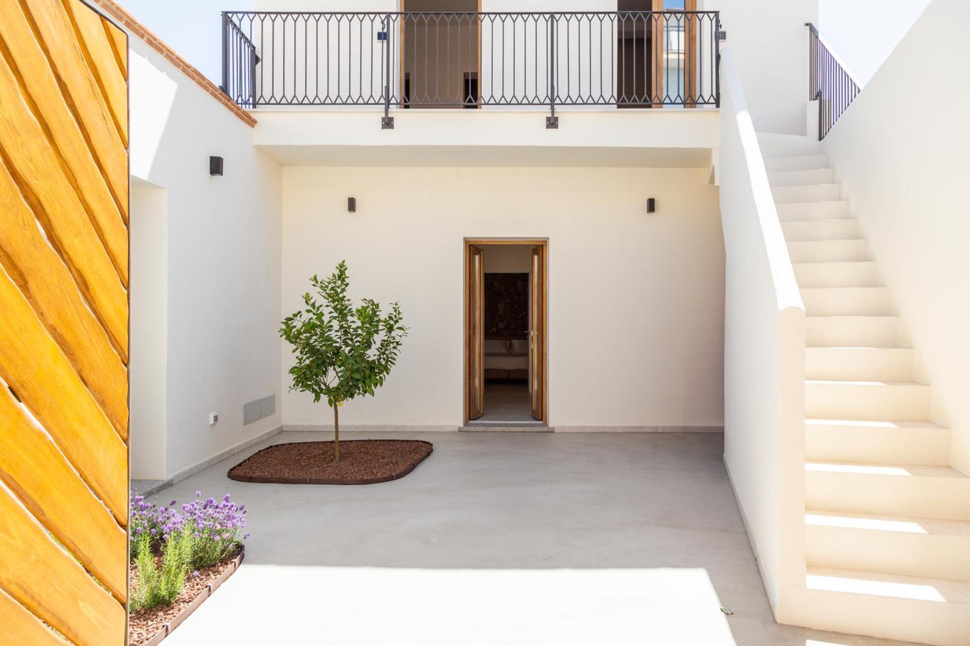 Ausentu Guest House Тортоли Экстерьер фото